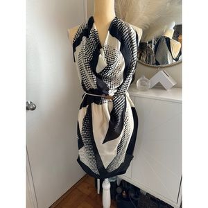 Sisley patterned dress with belt.